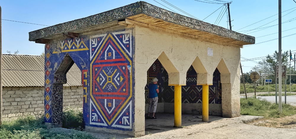Carpet pattern decorated Soviet-era bus stop in Neftchala, Azerbaijan