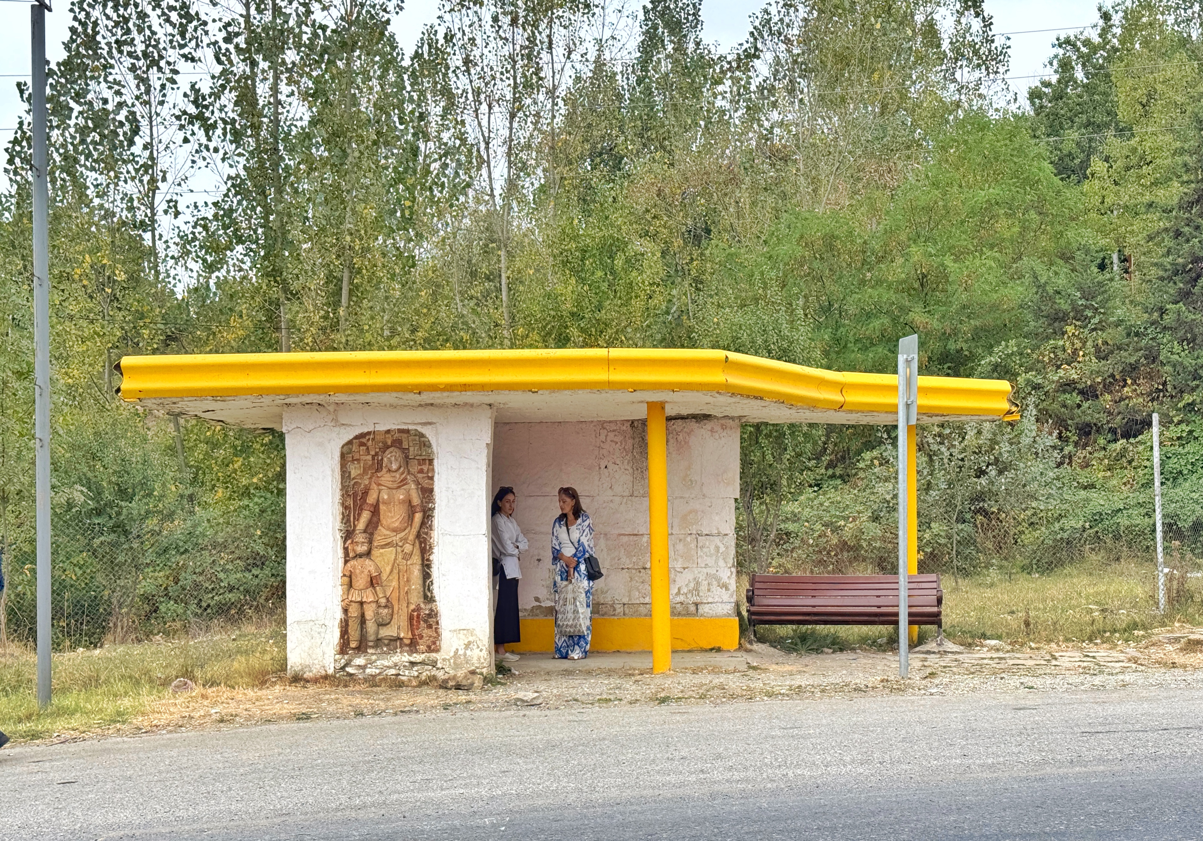 Ceramic panel art works and Soviet bus stop in Shamakhi, Azerbaijan, reflecting 1970s modernist design and local symbolism.